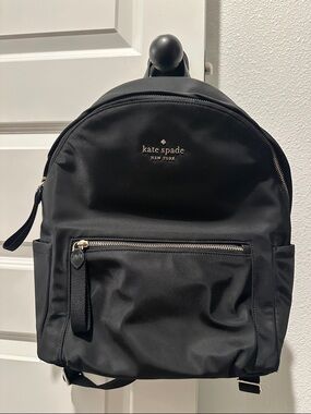 kate spade black nylon backpack with gold logo